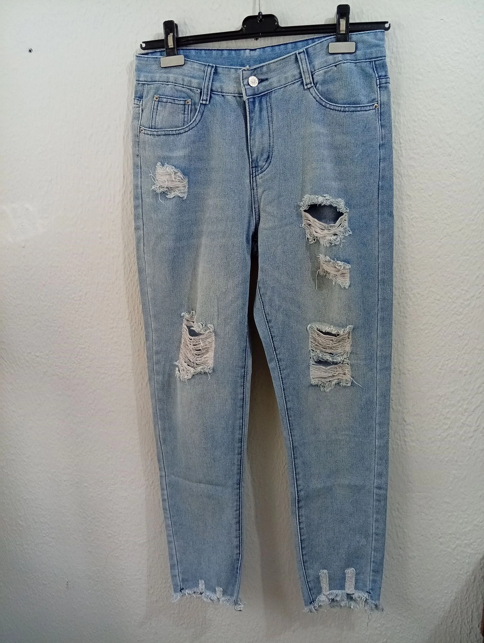Jean femme taille L Bleu clair avec effet déchiré tendance
